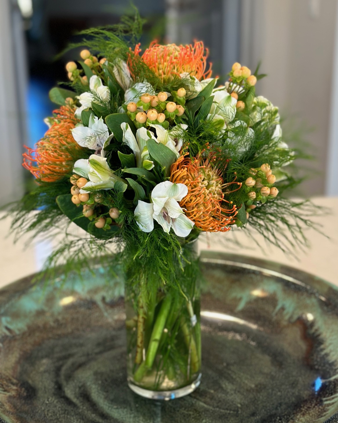 White Peruvian Lilies and Protea