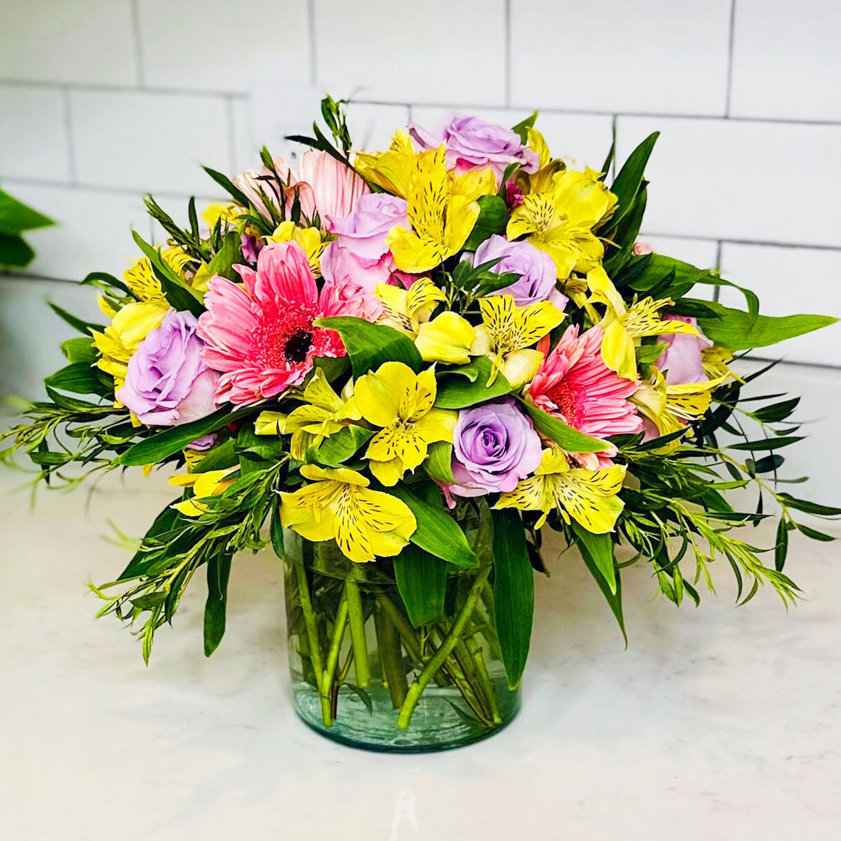 pastel bouquet, diasey, lilies and roses