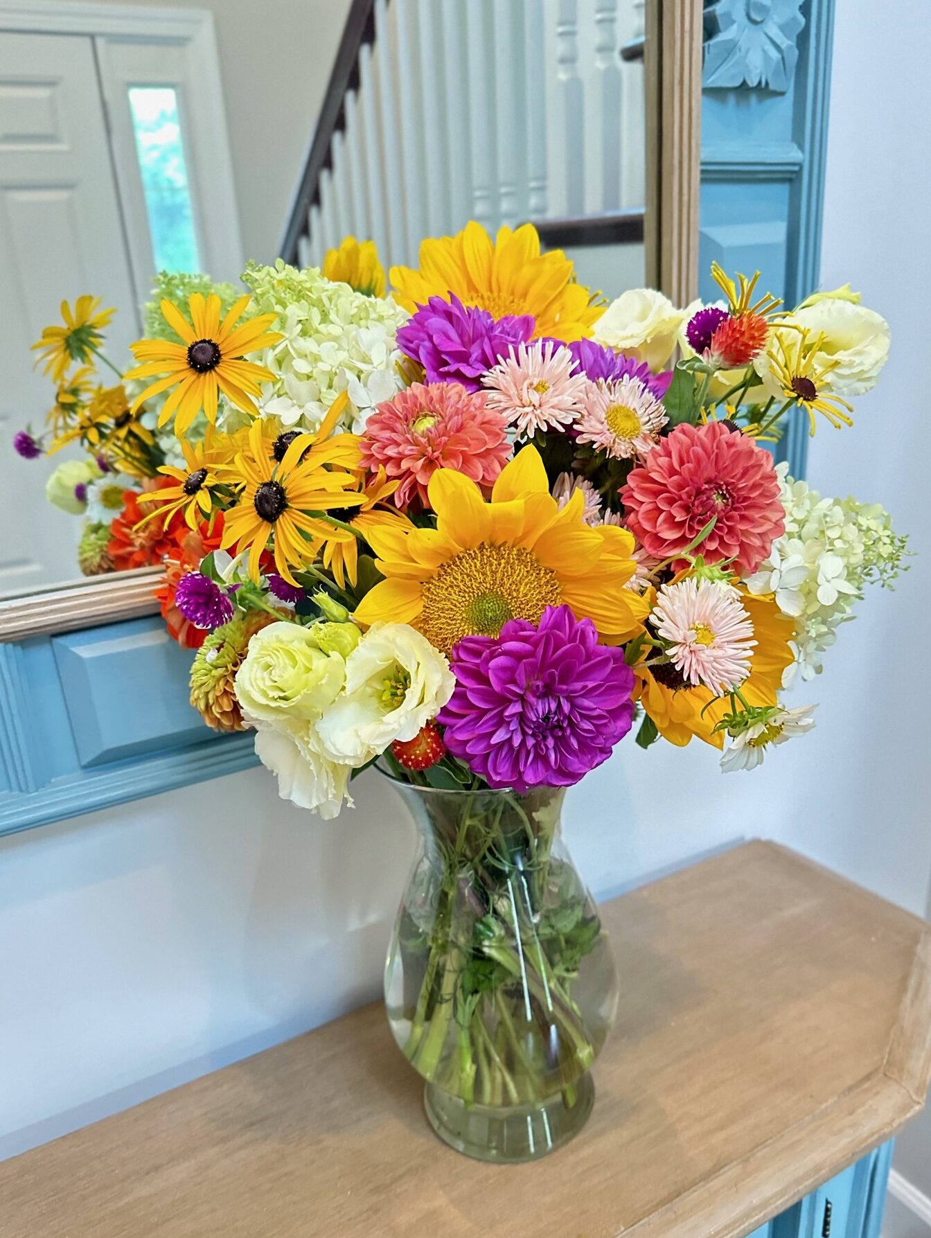 Sunflowers, Zinna, dahlia, asters, hydrangea, cloves, lisianthus, homegrown flowers, bright and colorful arrangements, Merry Bees Flower Farm arrangement