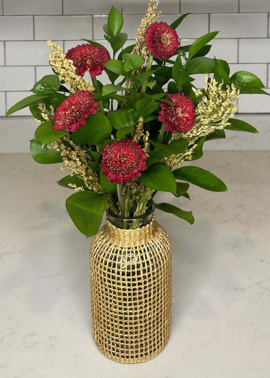 Deep Red Mums, Millet, Israeli Ruscus, Shiney greenery, floral arrangement/arranging, floral accents, flower, autumn/fall, home decor, floral design, wicker vase, autumn/fall vases